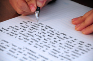 Image of person writing